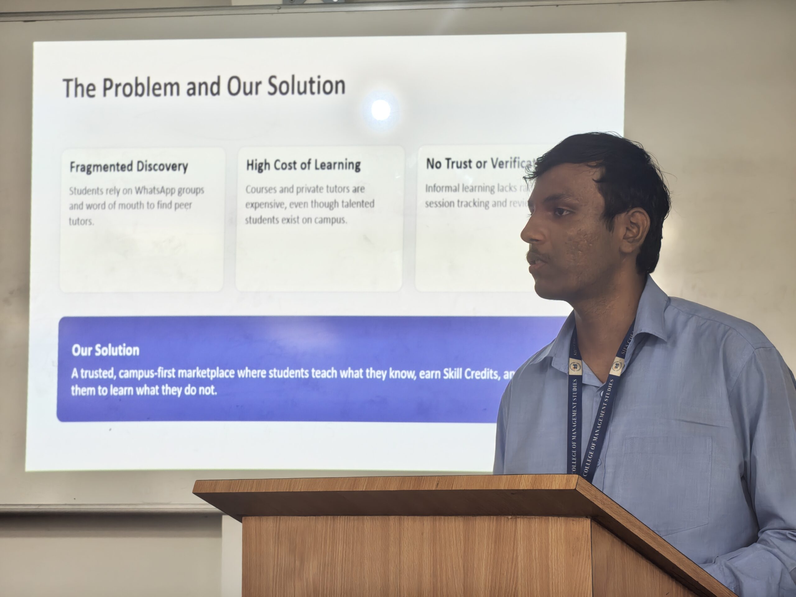 MCA student presenting a peer-to-peer learning platform at SIES Pitch Arena